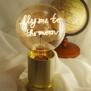 Unique decorative light fixture with cursive letter filament design. - hover