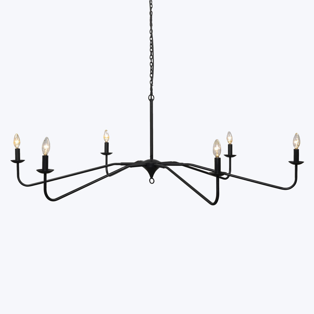 Contemporary black chandelier with eight electric candle style lights.