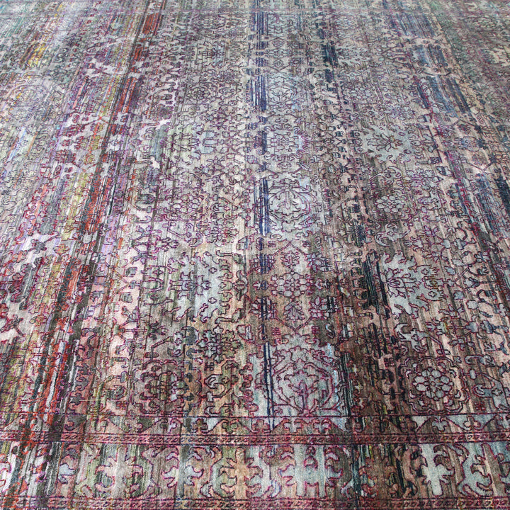 Colorful traditional rug with intricate floral and geometric patterns design.