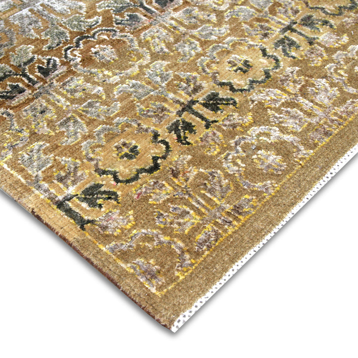 Intricate floral and filigree patterned rug with plush texture.
