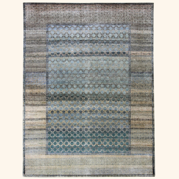 Vintage rectangular area rug with complex blue, beige, gray pattern.