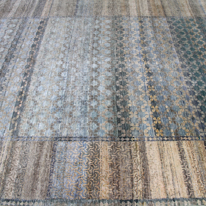 Close-up of patchwork carpet with various patterns and colors.