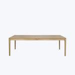 Rectangular wooden table with natural finish against neutral background, simple design