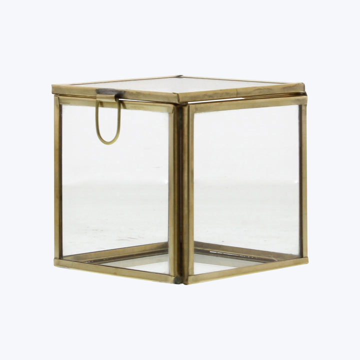 Square glass lantern with brass edges, latch, loop for hanging.