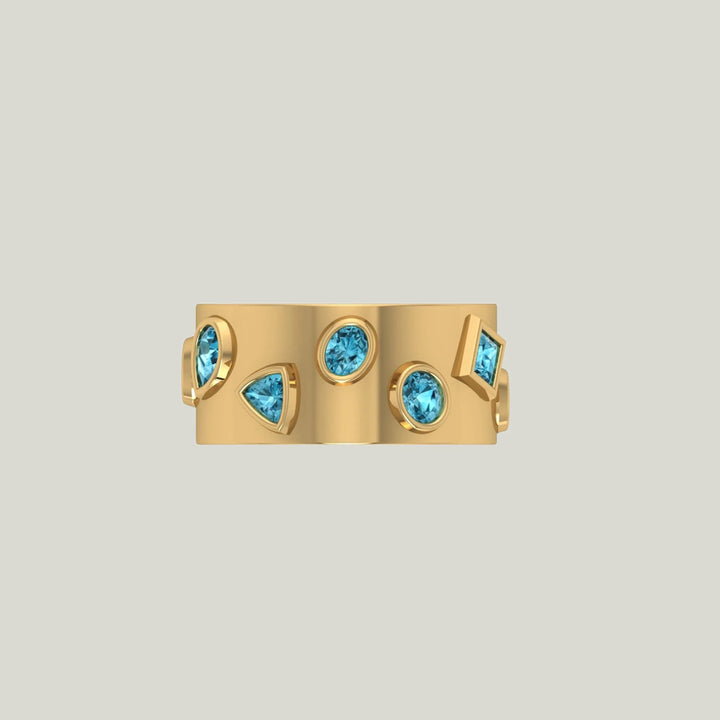 Modern gold band with vibrant blue gemstones in geometric settings