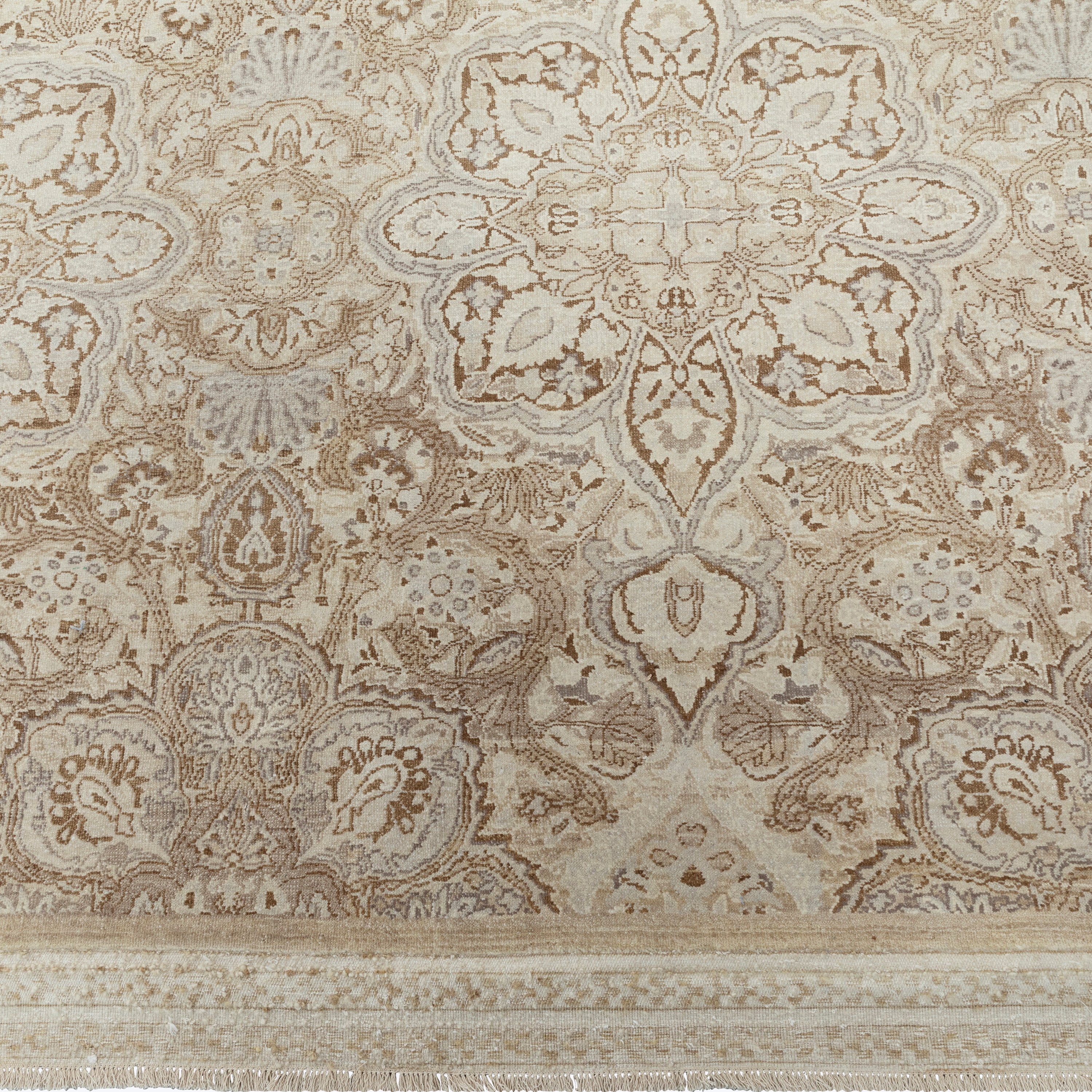 Luxurious ornate rug with symmetrical design in neutral tones.