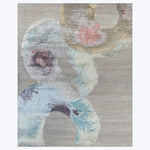 Modern abstract design rug with overlapping shapes in various colors.