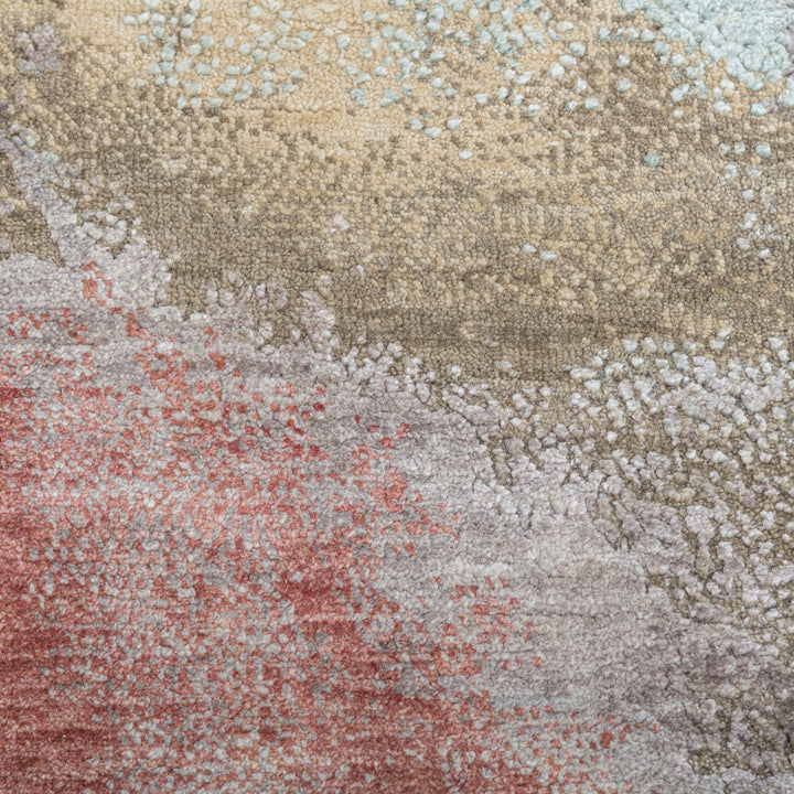 Close-up of plush, multicolored abstract carpet with vintage vibe.