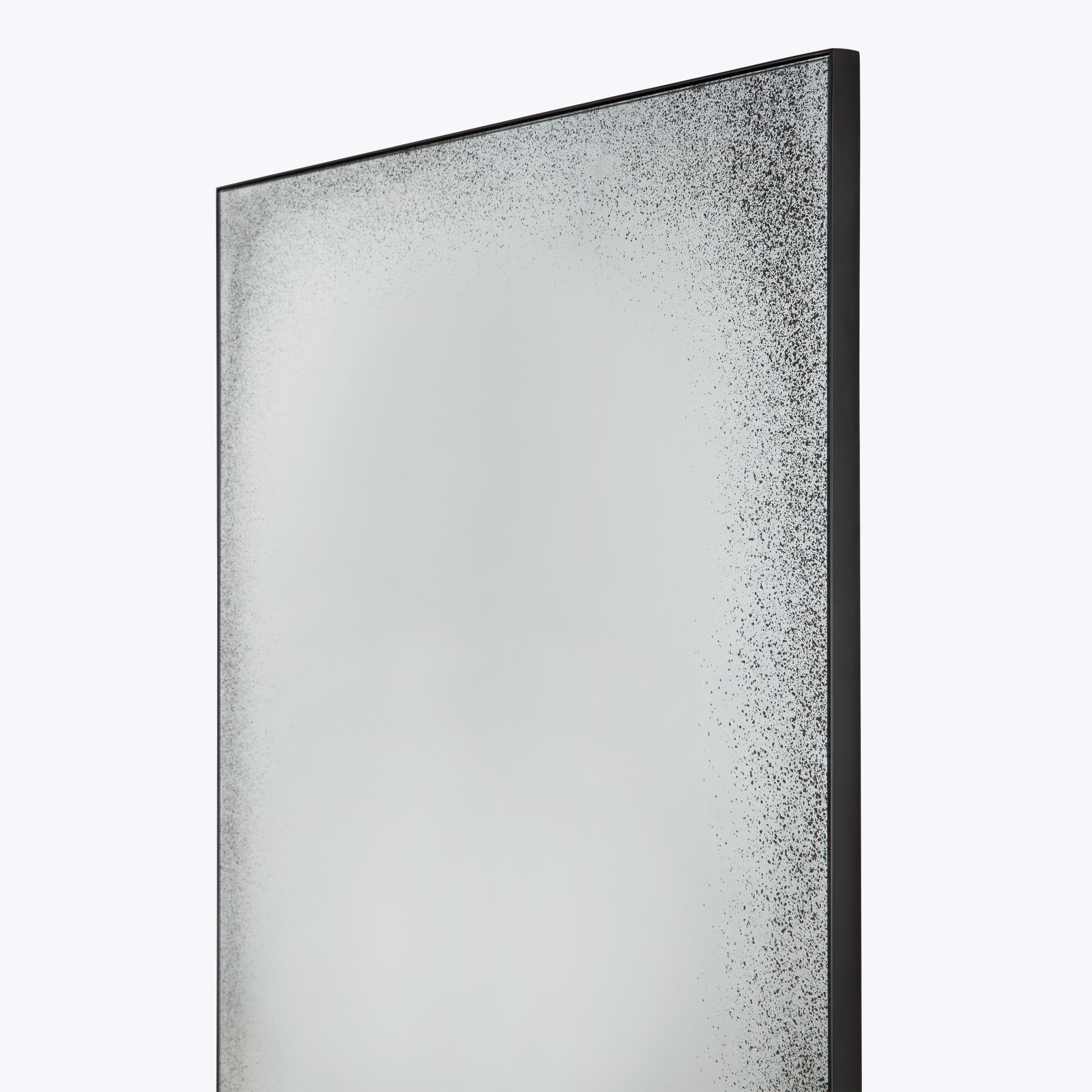 Frosted glass panel with black frame and gradient of dots.