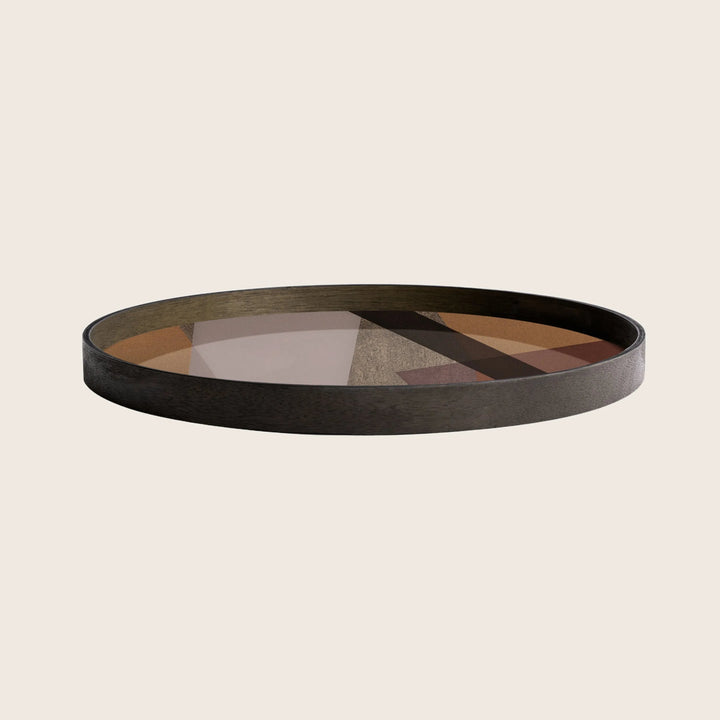 Modern decorative tray with textured black rim and geometric design.
