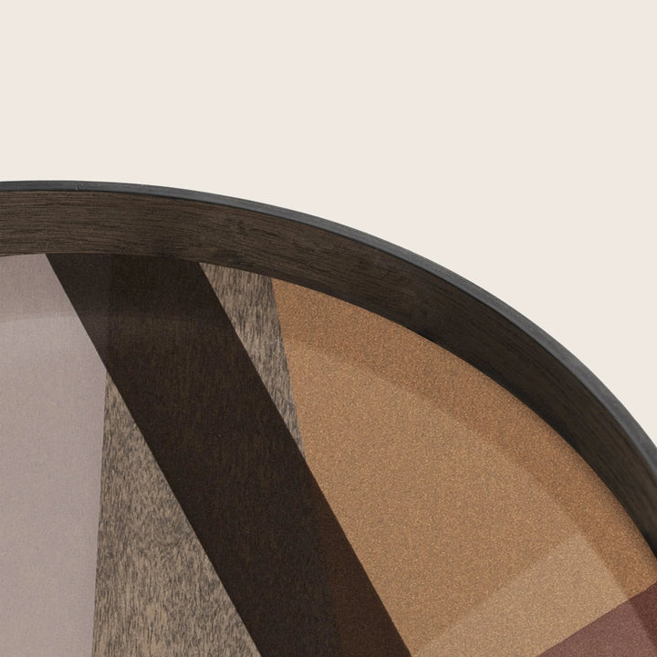 Close-up of textured circular object with brown and tan segments.