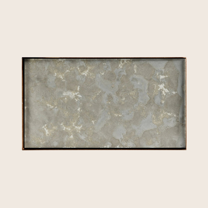 Rectangular table top with marble-like design and dark frame.