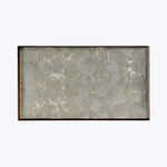 Rectangular table top with marble-like design and dark frame.