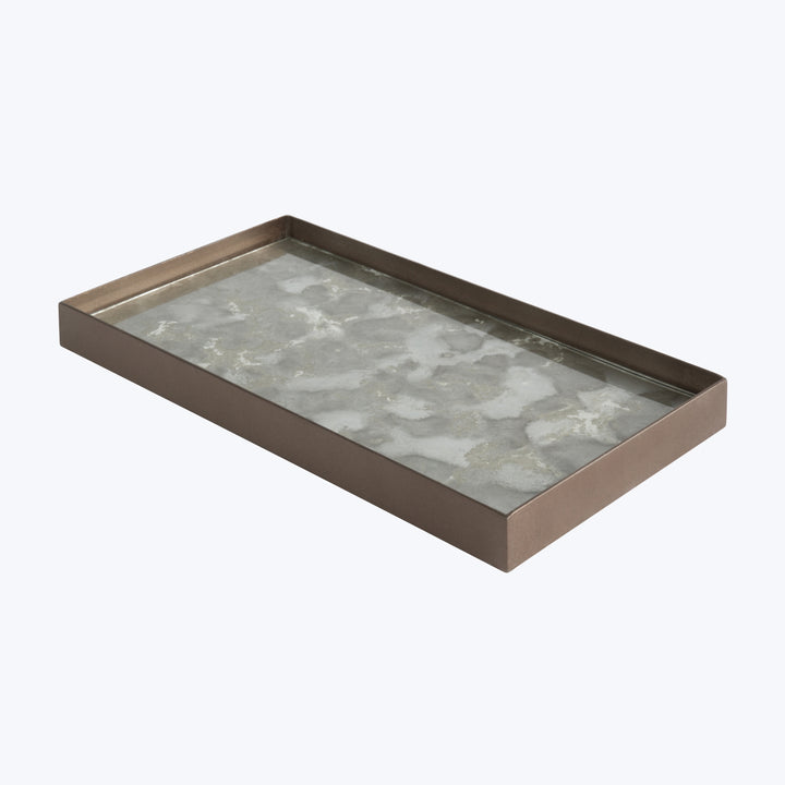Rectangular tray with metallic edge on marbled floor, minimalist design.