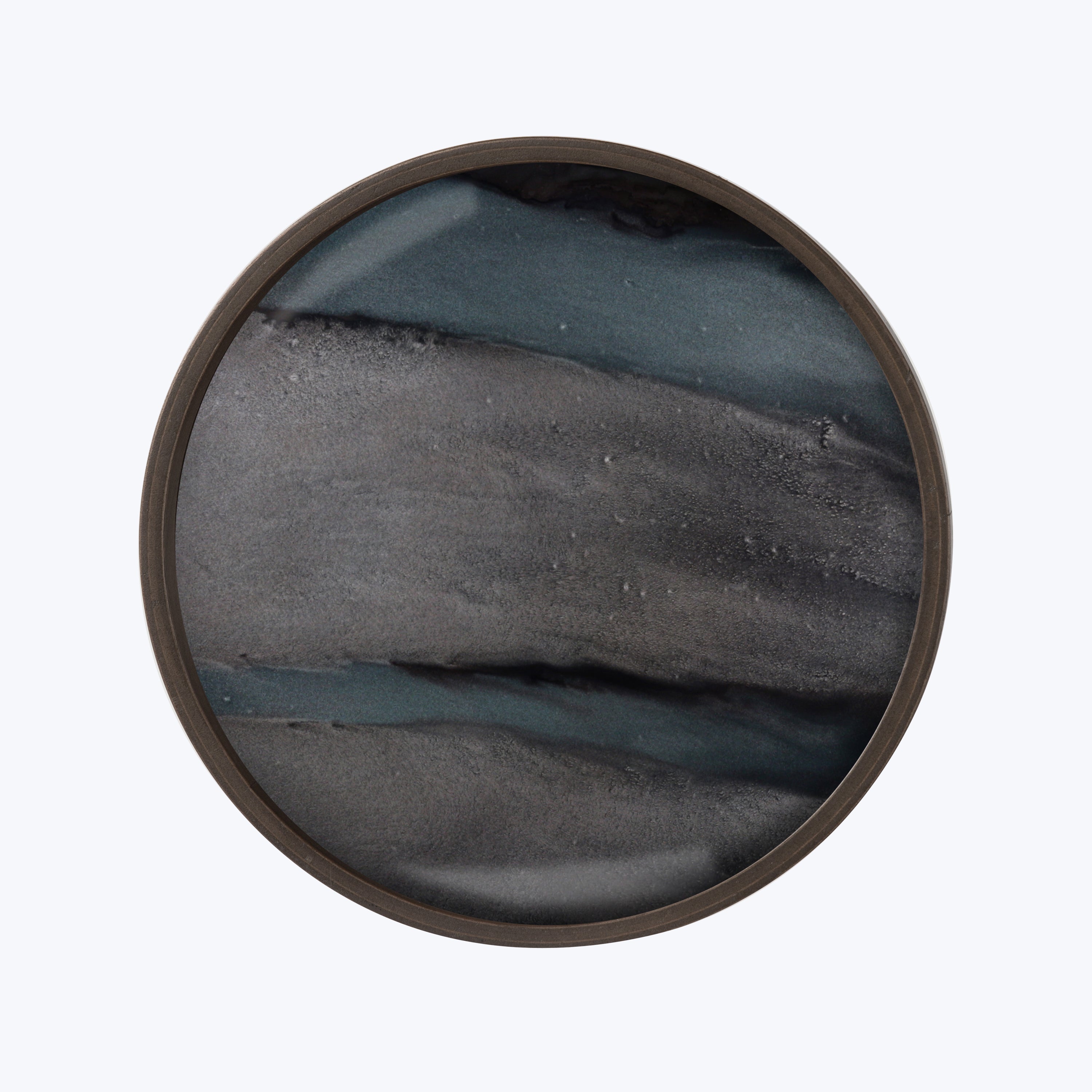 Circular stone-patterned coaster with layers of dark grey and blue.