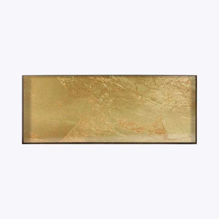 Abstract metallic textured panel on dark border against light background.