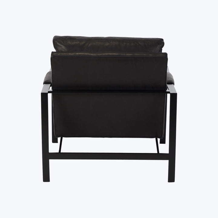 Modern armchair with black metal frame and leather upholstery design