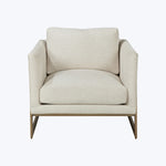 Modern single-seat armchair with cream upholstery and sleek metal legs.