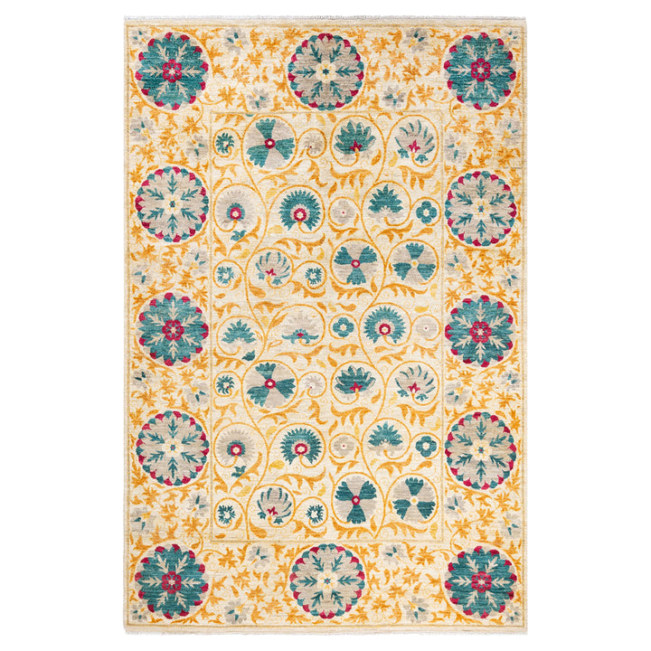 Ornate floral rug with intricate pattern in warm beige tones.