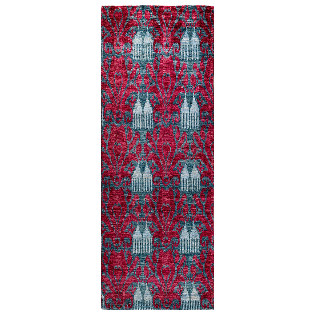 Long, narrow red and blue ornate area rug for sale.