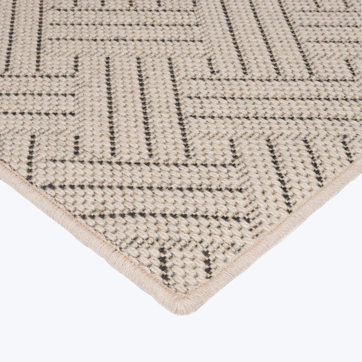 Modern geometric area rug in neutral tones with clean lines