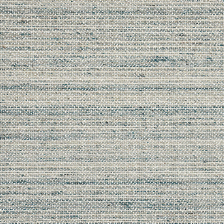 Textured fabric with woven pattern in shades of grey and blue