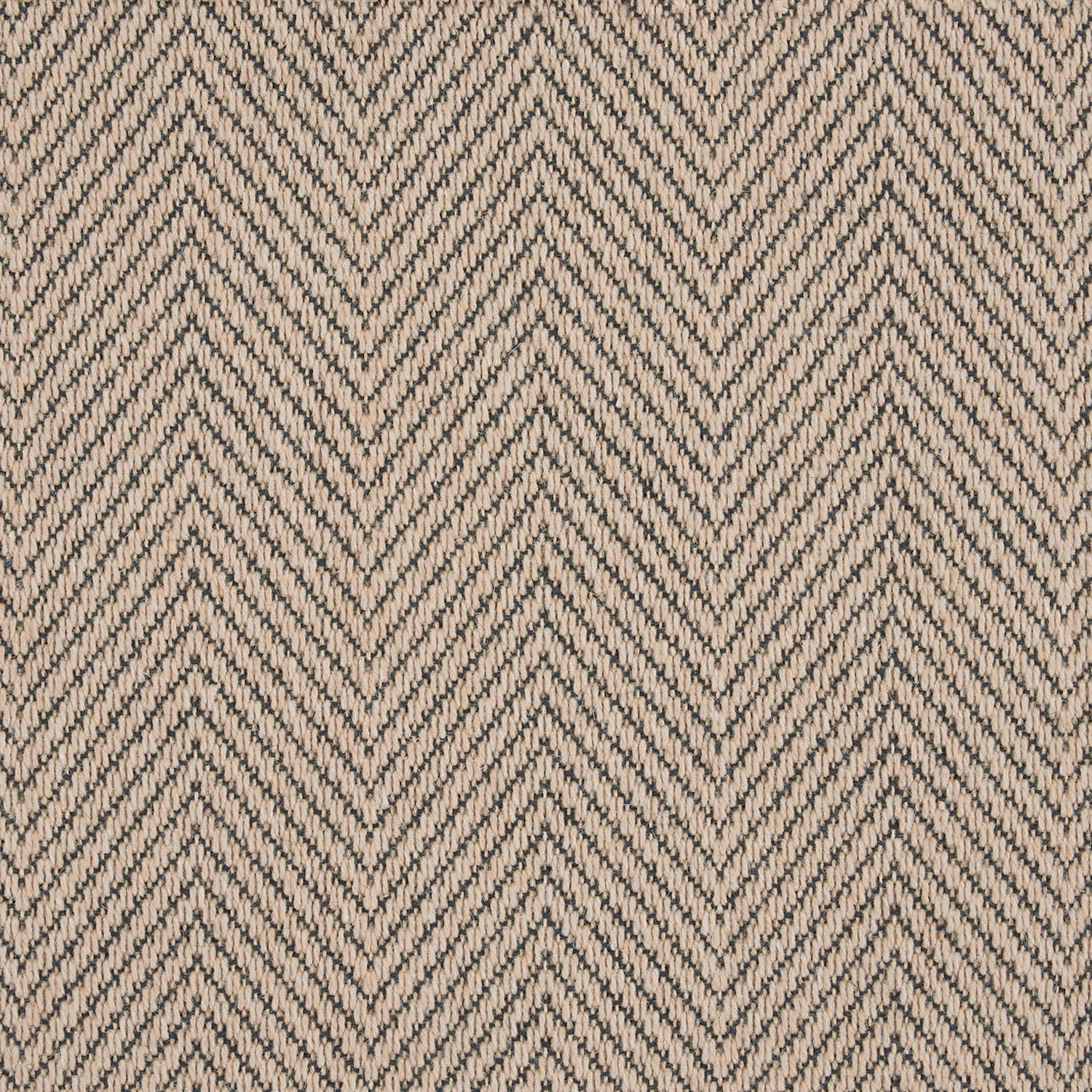 Close-up of herringbone fabric in beige and gray tones.