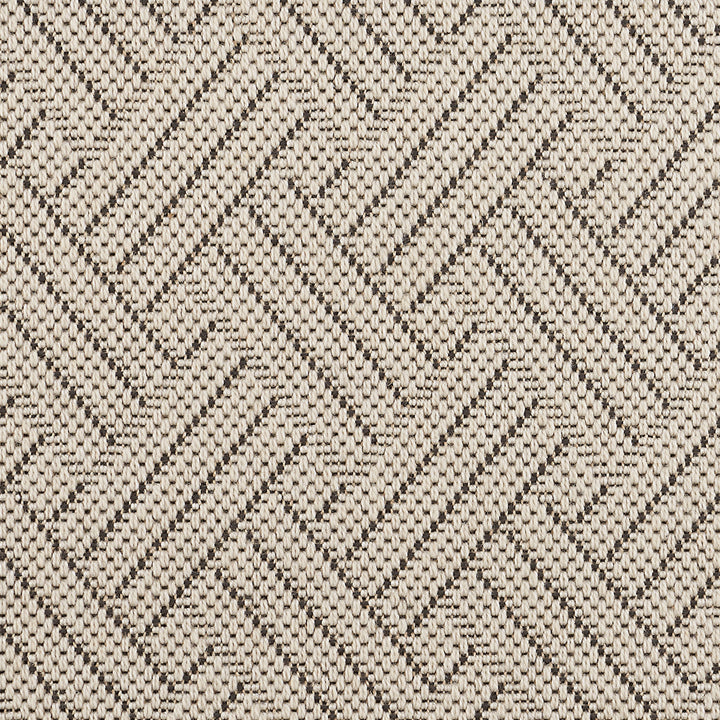 Close-up of herringbone pattern on woven fabric, dynamic and textured.