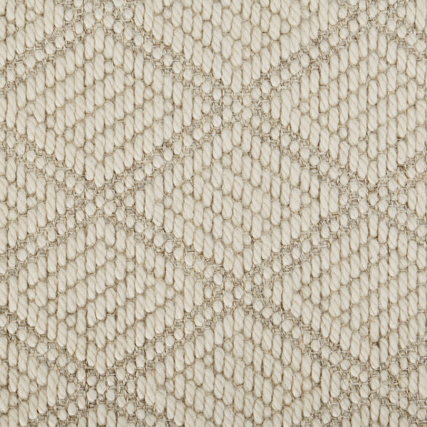 Detailed close-up of textured woven fabric with diamond pattern design.