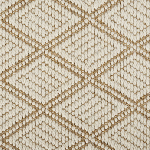 Close-up view of cream diamond patterned textured fabric material.