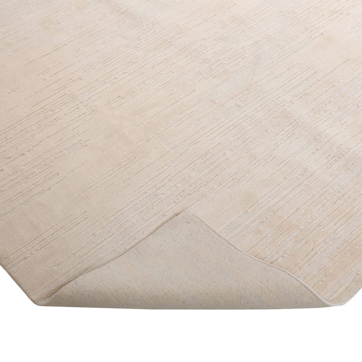 Cream Solid Tibetan Wool Silk Blend Rug - 8' x 10'