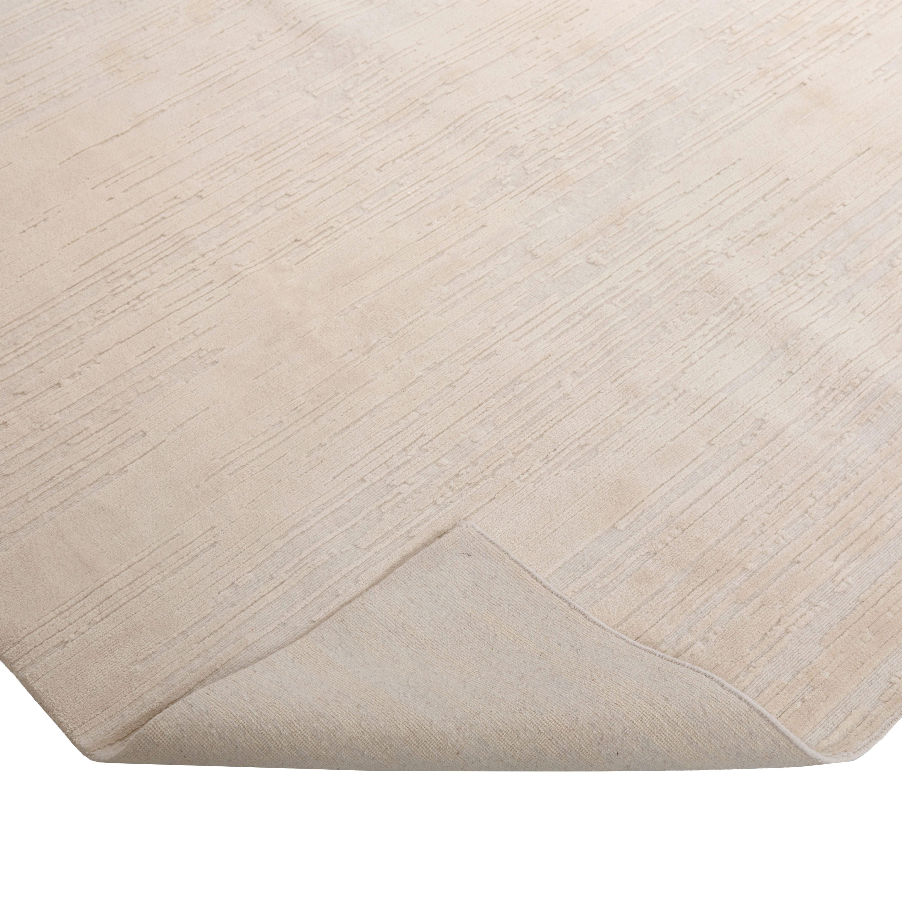 Cream Solid Tibetan Wool Silk Blend Rug - 8' x 10'