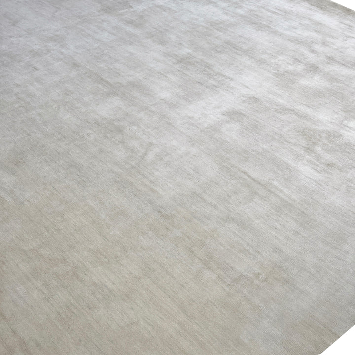 Ivory Solid Wool Silk Blend Rug - 9' x 12'