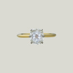 Contemporary Platinum and 18K Yellow Gold Cushion Cut Diamond Solitaire Ring