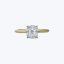 Contemporary Platinum and 18K Yellow Gold Cushion Cut Diamond Solitaire Ring