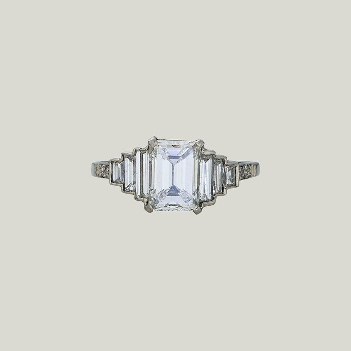 Contemporary Platinum Emerald Cut Diamond Ring;