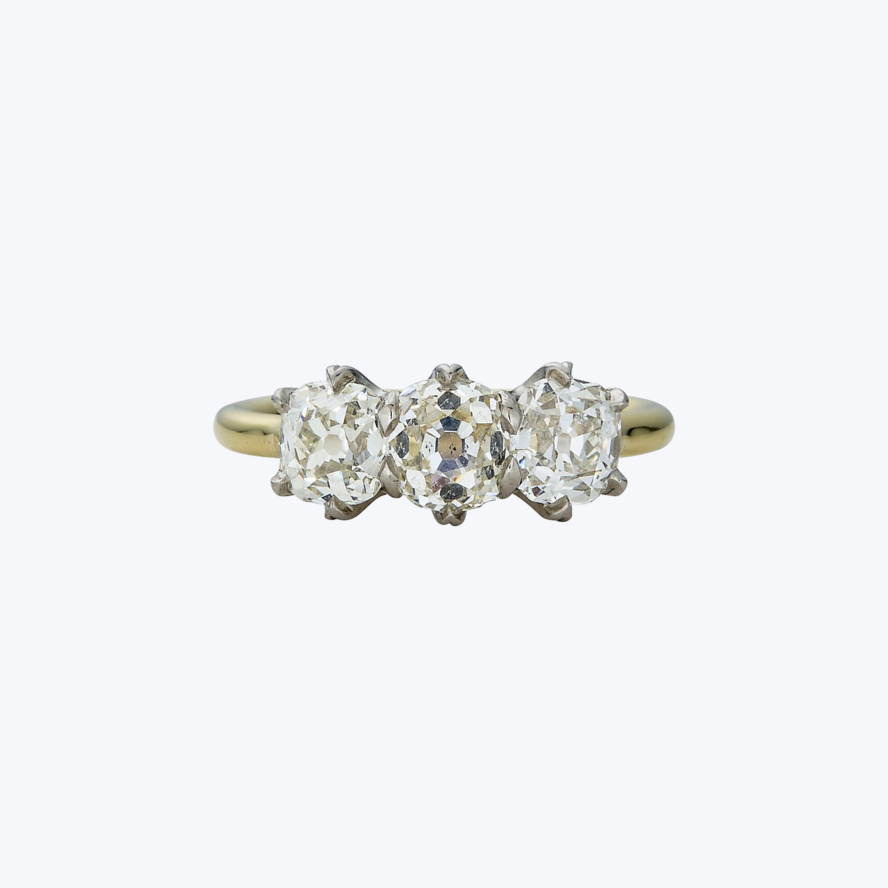 Contemporary 18K Yellow Gold and Platinum Diamond Trilogy Ring