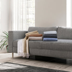 Cozy throw blanket and pillow set in natural tones and textures. - hover