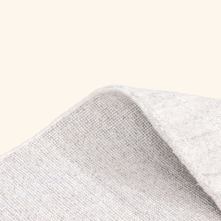 Ivory Solid Art Silk Wool Blend Rug - 5' x 8'