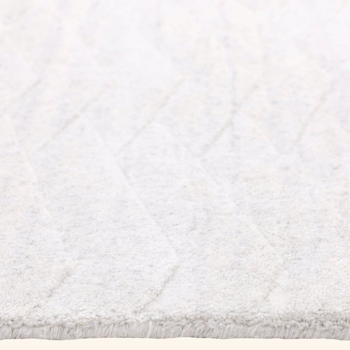 Ivory Solid Art Silk Wool Blend Rug - 5' x 8'