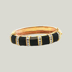 1980s American Onyx and Diamond Bangle in 18k Gold