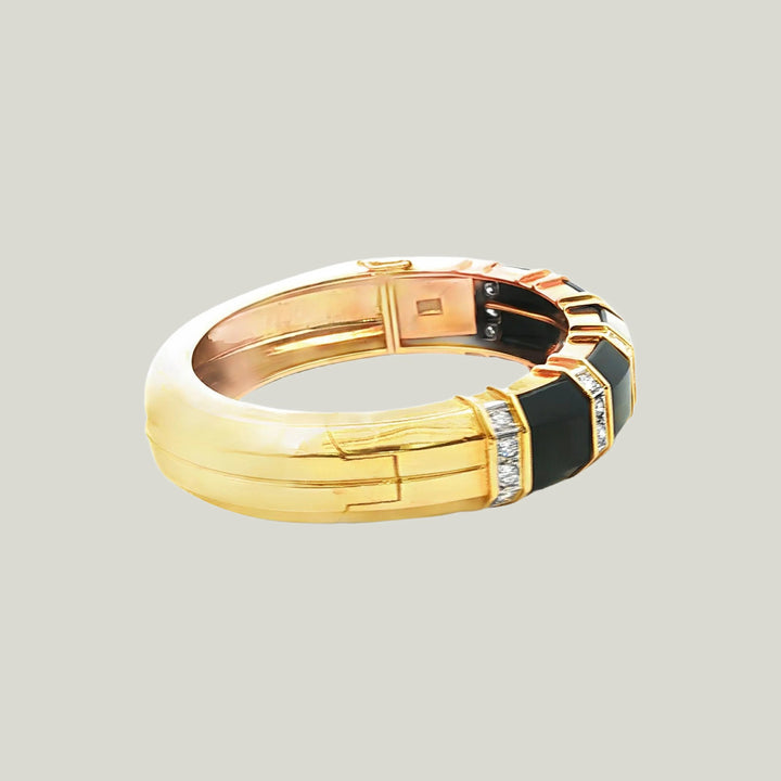 1980s American Onyx and Diamond Bangle in 18k Gold