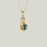 Pearl in Hand Pendant