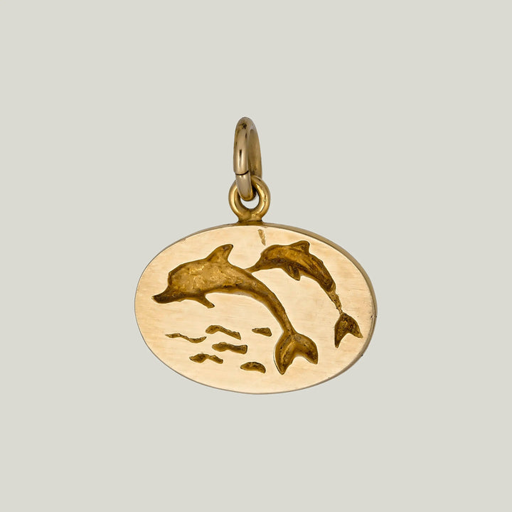 1950' Dolphins oval Charm in 14k Yellow Gold