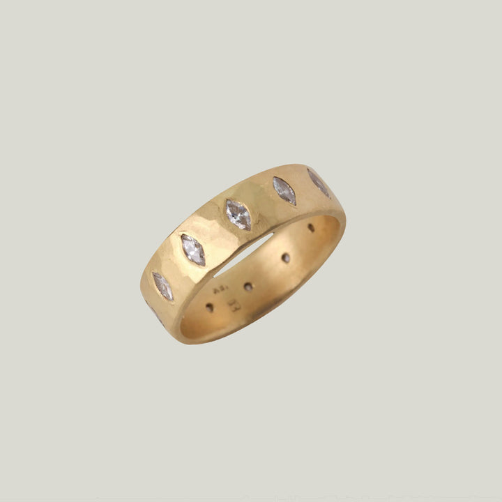 Image for 18ky gold hammered marquis eternity band