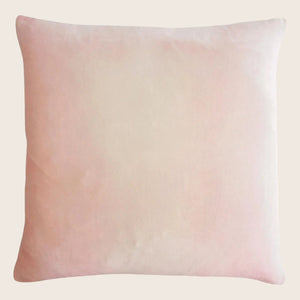 Square pink pillow with a soft watercolor-like gradient design. - hover