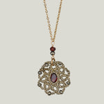 Caged Garnet and Pyrite on Gold Chain Necklace
