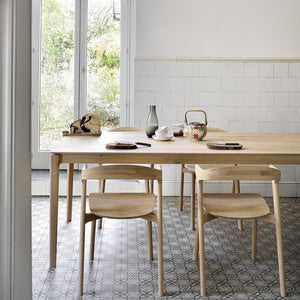 Minimalistic wooden table with clean lines and versatile design - hover
