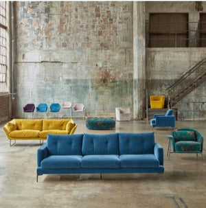 Modern, deep blue sofa with clean lines and plush cushions. - hover