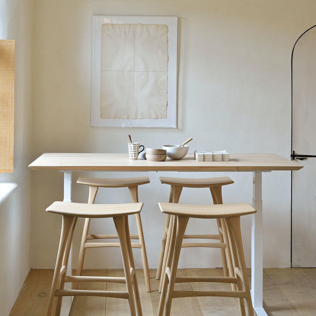 Modern Scandinavian dining area with minimalist design and natural lighting.